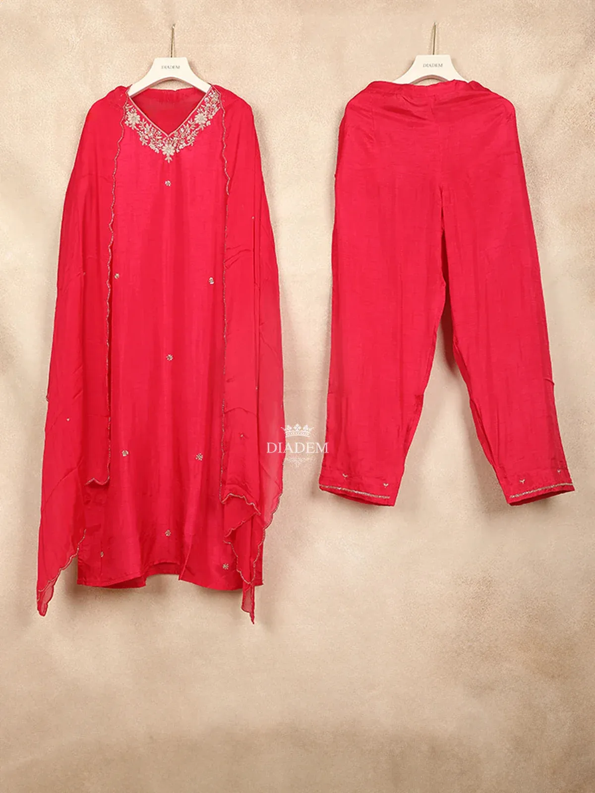 Dark Pink Straight Cut Salwar Suit Adorned with Embroided Flora Design with Dupatta.